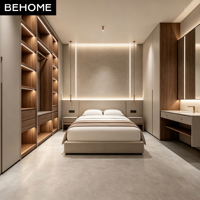 Dressing intégré avec éclairage LED, coiffeuse intégrée et unité de lit pour mobilier de chambre de villa, hôtel, appartement