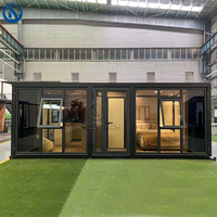 Cabine préfabriquée moderne extensible à double aile pliante, maison conteneur en acier respirant de 20 pieds ou 40 pieds, garantie 1 an