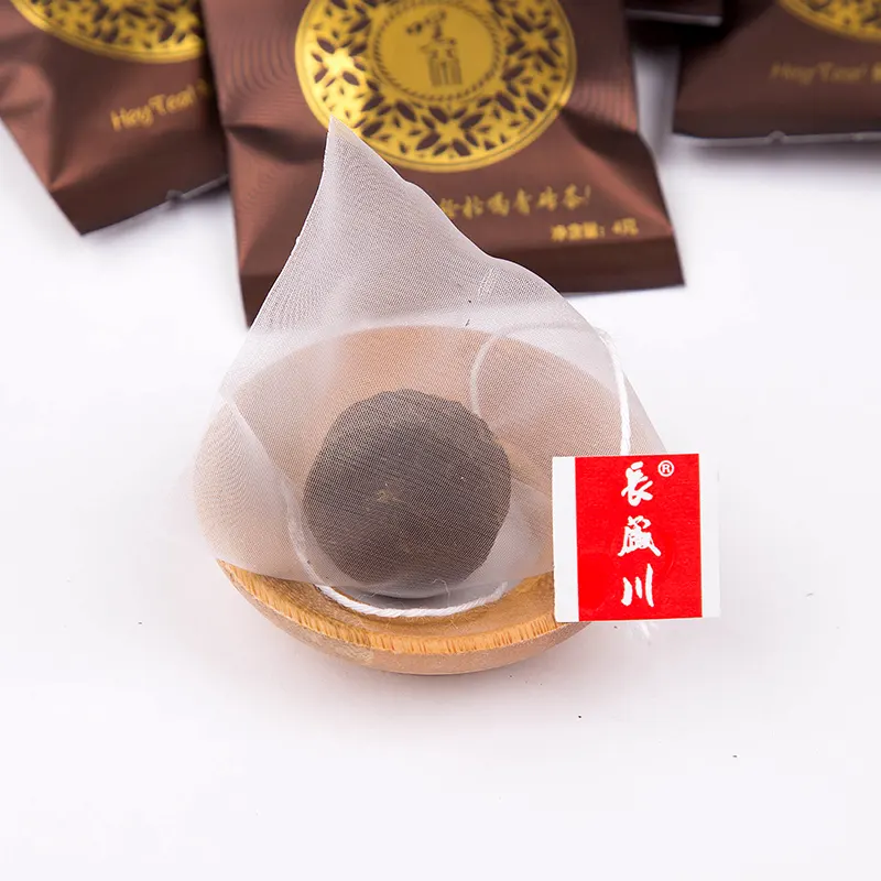 Changshengchuan Chinese black tea round mini brick tea with biodegradable tea bag
