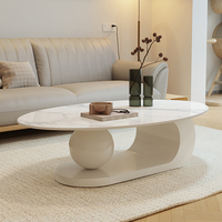 Table basse créative de style crème, ovale, pour salon, petite unité domestique, style italien minimaliste avec rangement