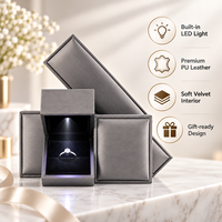 Boîte à bijoux en cuir PU avec éclairage LED intégré, intérieur en velours, pour fête de fiançailles, cadeau de vacances, présentoir de bijouterie