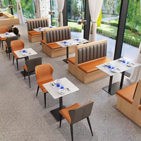 Table à manger en marbre orange personnalisable pour restaurant occidental Snack House Tea Shop Bois Cuir Contemporain pour hôtels écoles