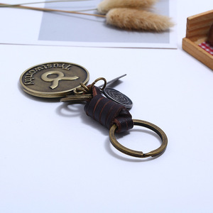 Porte-clés vintage 12 signes <span class=keywords><strong>du</strong></span> zodiaque, pendentif constellation en bronze avec anneau en cuir tressé pour hommes et femmes - Product Image 3
