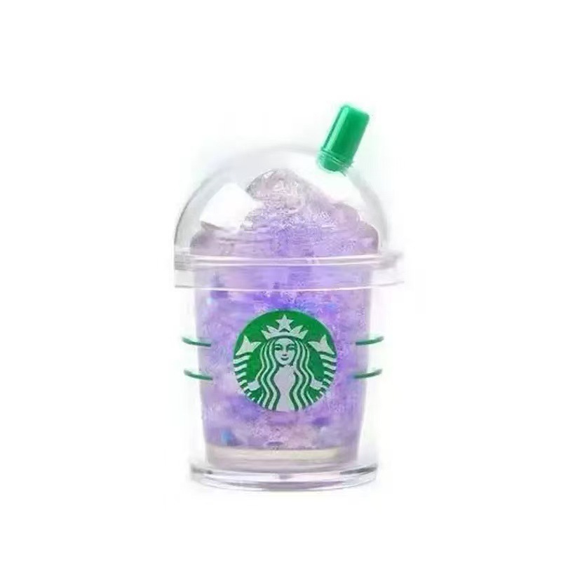 Jouet à presser en forme de tasse de thé au lait - violet - emballage boîte.