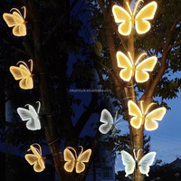 NIKA Vente en gros d'ailes de papillon en acrylique électriques automatiques à LED murales pour la décoration