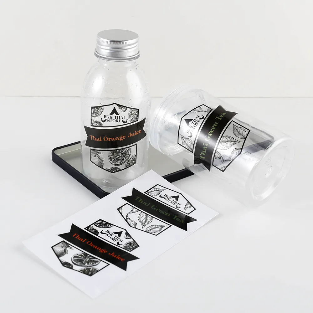 Benutzer definierte transparente PVC-Vinyl-Aufkleber Schwarzes Logo Gedrucktes weißes Etikett für Flaschen verpackungen