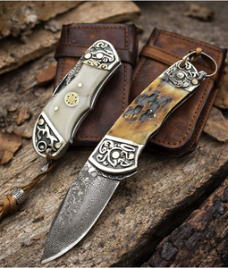 Couteau de poche pliant de survie UN512R en gros, mini couteau à lame tranchante en <span class=keywords><strong>damas</strong></span>, manche en os de vache marron-jaune sculpté en laiton - Product Image 2