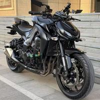 Motocicleta Kawasaki Z400 de 400cc, Bicilíndrica en Paralelo, Refrigeración Líquida, Inyección Electrónica, Frenos ABS, Estilo Naked