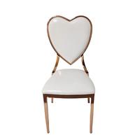 Chaise en métal or rose avec dossier en forme de cœur en PU blanc pour mariage