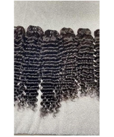 Extensions de cheveux humains à donneur unique indien brut pur naturel ondulé bouclé avec alignement des cuticules non transformés approvisionnement en gros