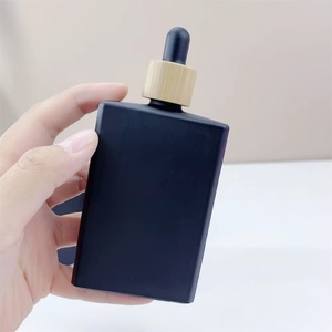 100ml Stock Matte Black Rectangle Square Glass <b>Dropper</b> <b>Bottles</b> with Bamboo <b>Dropper</b> Cap for Cosmetic Packaging - Product Image 1