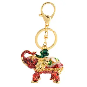 Chaveiro criativo de cristal de elefante para mulheres, porta-chaves com pingente de ouro e strass, porta-chaves com pingente de carro para mulheres e meninas