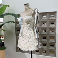 Ensemble de mode avec camisole en dentelle et patchwork, nouveau style d'été, jupe évasée à taille haute à fleurs, ensemble deux pièces