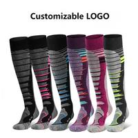 Chaussettes de ski en laine mérinos, épaisses, avec coussinets en tissu éponge, thermiques, longues, pour hommes et femmes, idéales pour la randonnée, le trekking et les sports d'hiver