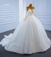Robe de mariée de luxe Feishiluo à col rond, style moderne, coupe princesse, manches longues, ornée de perles, de paillettes et d'appliques brodées en dentelle