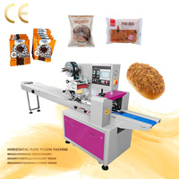 Machine d'emballage horizontale automatique pour pain, gâteaux, pain pita, tortillas, croissants, beignets et autres produits en forme de coussin