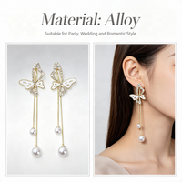 Boucles d'oreilles pendantes tendance en alliage avec fleurs, perles simulées, style bohème, longues, pour femme, bijoux de fête et de vacances