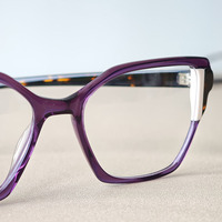 Lunettes optiques en acétate d'oeil de chat à la mode montures de lunettes de couleur populaires avec type de motif solide de stratification