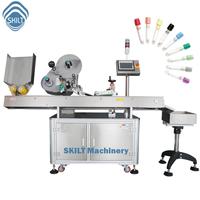 Machine d'étiquetage horizontale de haute précision SKILT pour tubes de réactifs et tuyaux en caoutchouc avec contrôle servo