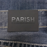 Étiquettes personnalisées en cuir véritable pour vêtements et jeans, avec logo en PP sérigraphié et estampé à chaud, design en cuir de vachette, fabriquées en Chine
