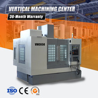 Centre d'usinage vertical VMC650, broche BT40, guidage linéaire, commande numérique FANUC, fonction automatique pour pièces en alliage d'aluminium