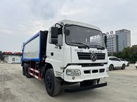 Camion à ordures compacteur d'occasion de 20 mètres cubes à double essieu arrière, châssis Dongfeng, moteur Yuchai, boîte de vitesses rapide à 8 rapports avec réservoir d'eaux usées