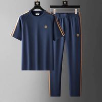 Ensemble deux pièces haut de gamme confortable et absorbant la transpiration pour homme, col rond, manches courtes, brodé