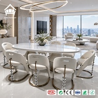 Moderne minimalistische ovale eettafel met marmeren blad, voetstuk en 8 kristallen stoelen, restaurantset, complete huisinrichting op maat