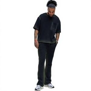 Conjunto Deportivo de Algodón Negro para Hombre, Cuello Redondo, Manga Corta, Color Sólido, Corte Holgado, Pantalones Largos Casuales con Bolsillos Laterales - Product Image 1