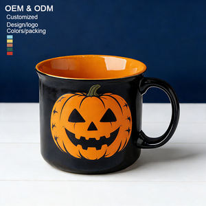 مجموعة أكواب سيراميك مخصصة بتصميم الهالوين باللونين الأسود والبرتقالي مع نقش جمجمة وشبح وزخرفة شريطية - Product Image 1