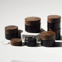 Pot de pots de crème en verre noir givré mat personnalisé de 50g 30g 15g 10g 5g 10ml 20ml 50ml contenants avec couvercles en bambou et grain de bois