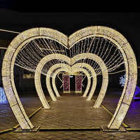 Nouvelle vente chaude Décoration Tunnel de mariage LED Arche lumineuse en forme de cœur Extérieur