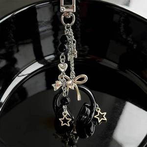 1 pièce Porte-clés ou breloque de sac pour téléphone, style Instagram, avec écouteurs musicaux stylés et un design unique, doux et audacieux - Product Image 3