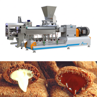 Machine à extrusion bivis pour la fabrication de snacks gonflés co-extrudés à cœur de crème