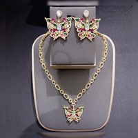 TIANSHE Ensemble de bijoux vintage haut de gamme de style français, romantique et luxueux, avec pendentif papillon exquis, boucles d'oreilles, collier et bague