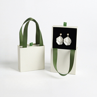 Boîte à bijoux en carton avec poignée, logo personnalisé, doublure en éponge, boîte de rangement et d'emballage portable pour collier, bague, boucles d'oreilles