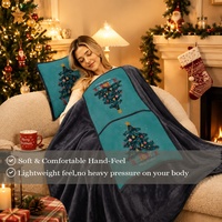 Coussin-plaid 2-en-1 Bindi Joyeux Noël en flanelle douce à imprimé de Noël, convertible en coussin et couverture, cadeau de fêtes pour canapé et décoration intérieure