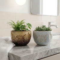 Grand pot en céramique en forme de coquillage avec texture spirale, glaçure réactive marron et bleue, décoration côtière, vente en gros