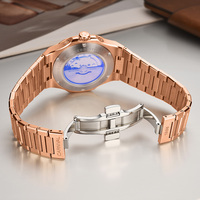 Montre mécanique multifonctionnelle pour homme CARNIVAL en acier inoxydable avec bracelet doré et cadran marron Dali Moon Phase