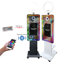Produit phare aux États-Unis : Cabine photo miroir à écran tactile de 21,5 pouces avec éclairage RVB, compatible avec les appareils photo reflex numériques, et kit de transport en flight case