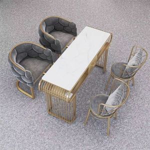 Ensemble table et chaises de manucure en marbre de luxe léger, table de manucure multi-personnes en fer forgé pour application en salon de manucure - Product Image 4