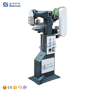 China import direct adhesive tape paperboard box corner pasting machine