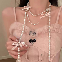 Collier élégant à nœud papillon à pois, double rang de perles, chaîne de pull mignonne, ras-de-cou de fête, chaîne de clavicule de luxe