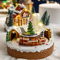 Décorations de Noël, train rotatif lumineux, boîte à musique, arbre de Noël en résine, igloo, ornements de bureau, cadeaux de Noël.