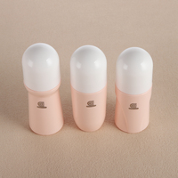 Flacon à bille en verre rose clair avec bouchon blanc 100 ml pour huile cosmétique et parfum
