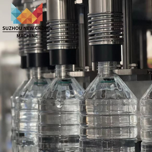 SUZHOU NEW CROWN Machine professionnelle électrique de lavage, remplissage et bouchage pour boissons et eau en bouteille, avec support technique complet - Product Image 1