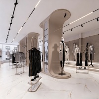Portant à vêtements rotatif et pliable sur pied en métal personnalisé, facile à assembler, pour la rénovation de magasins de vêtements