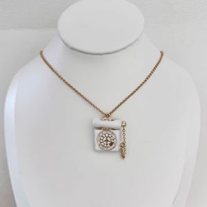 <span class=keywords><strong>Collier</strong></span> pendentif téléphone vintage SongYi, émail coloré, charme de téléphone rétro mignon, chaîne de cou pour femmes - Product Image 2