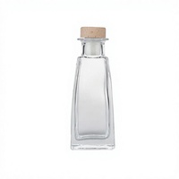 Bouteille en verre de luxe à base carrée personnalisée 100 ml pour vin et aromathérapie, idéale pour diffuseur à bâtonnets