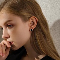Jual promo perak emas hitam jumlah besar Beli semanggi elegan berlian imitasi perak murni anting lapis listrik perhiasan untuk wanita